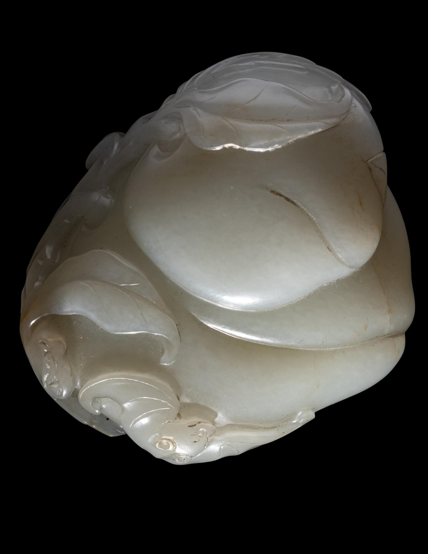 A Carved White Jade 'Peaches and Bat' Group