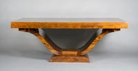 A French Art Deco Dining Extension Table, Height 28 1/2 x width 73 x depth 41 3/4 inches closed.