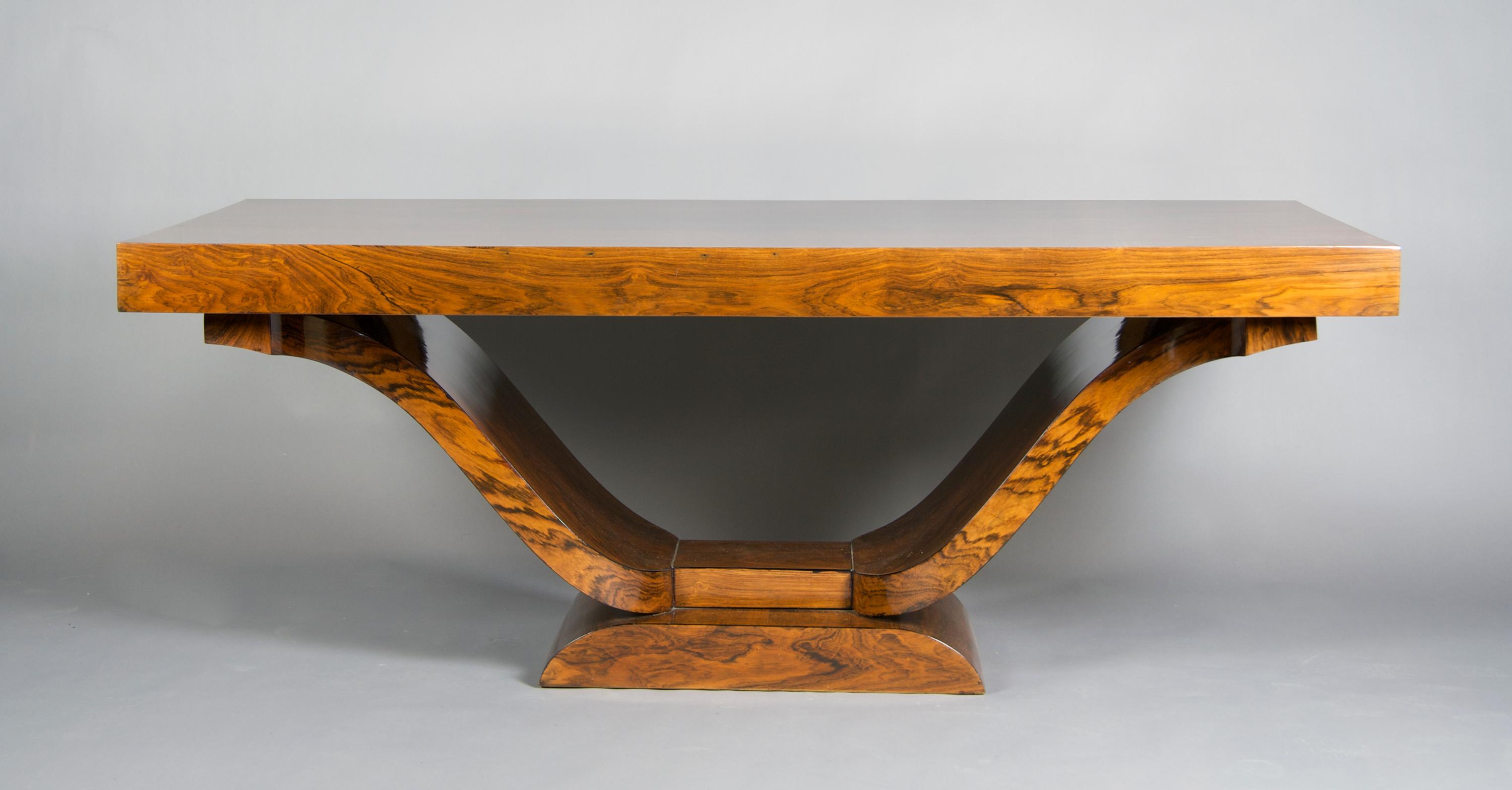 A French Art Deco Dining Extension Table, Height 28 1/2 x width 73 x depth 41 3/4 inches closed.