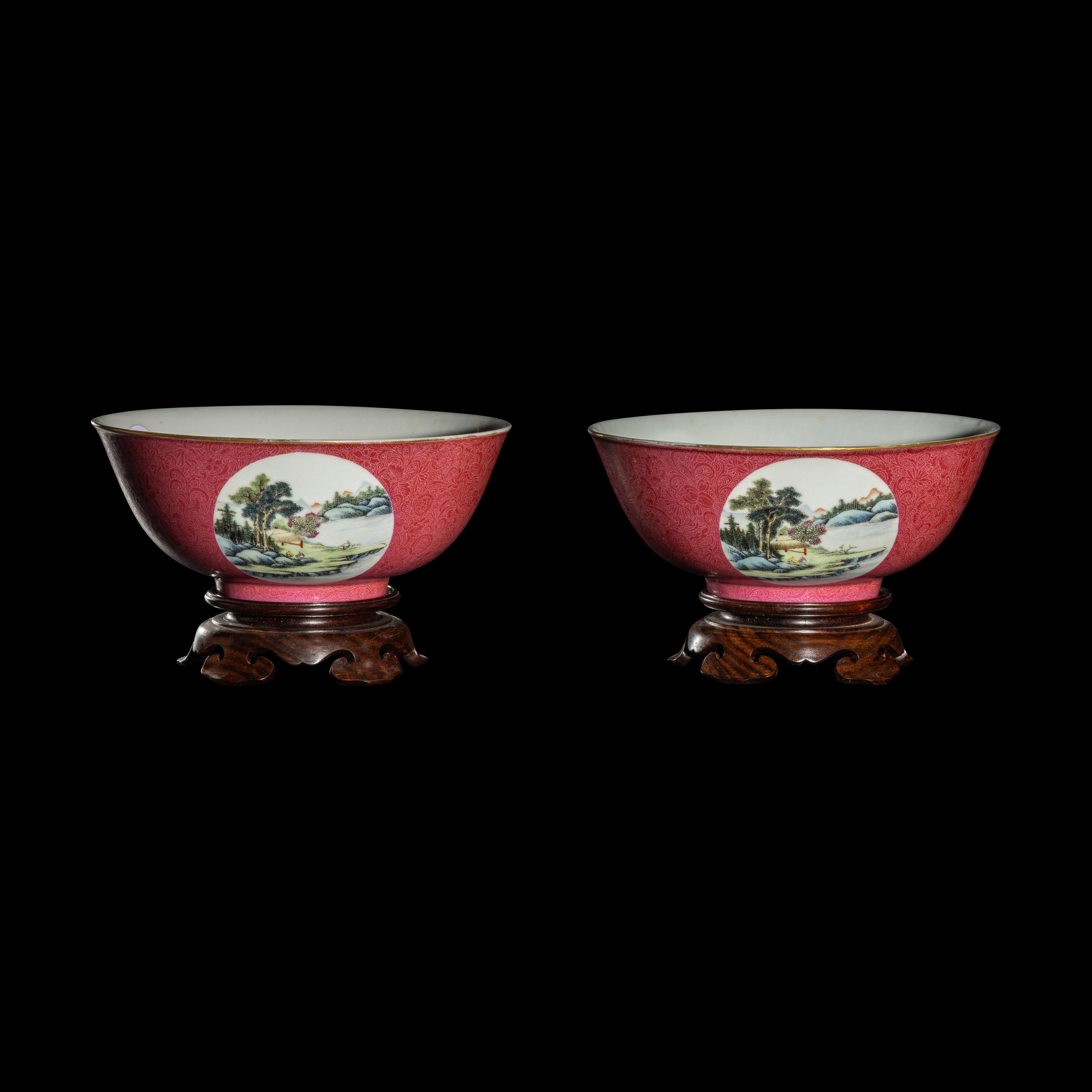 A Pair of Chinese Famille Rose Ruby Ground Porcelain 'Landscapes' Bowls, 20th Century 近代 胭脂紅地軋道開光山水圖碗一對