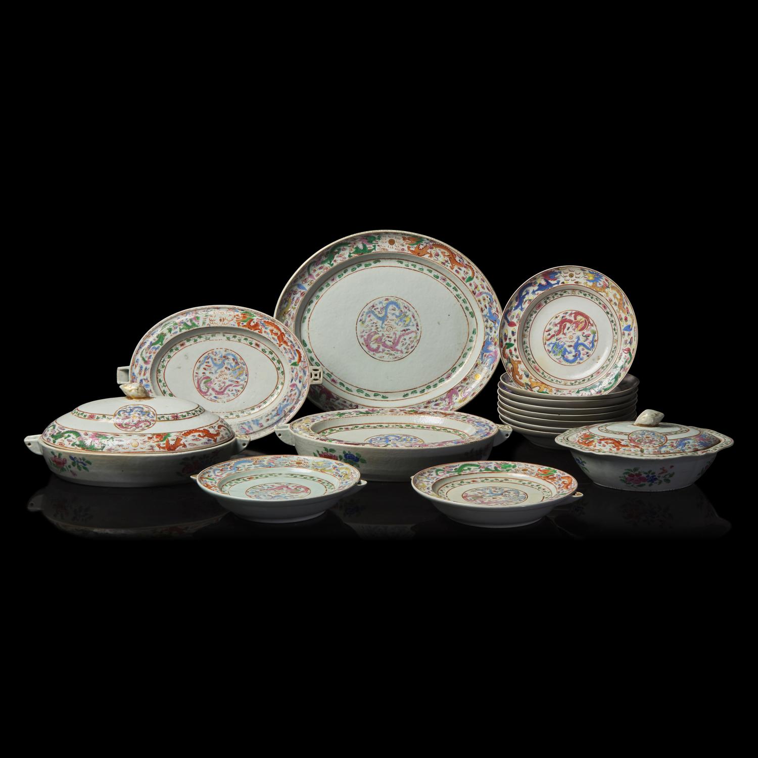 A Chinese Export "Dragons" Part Table Service, 19th Century 外銷粉彩龍紋盤一組十五件