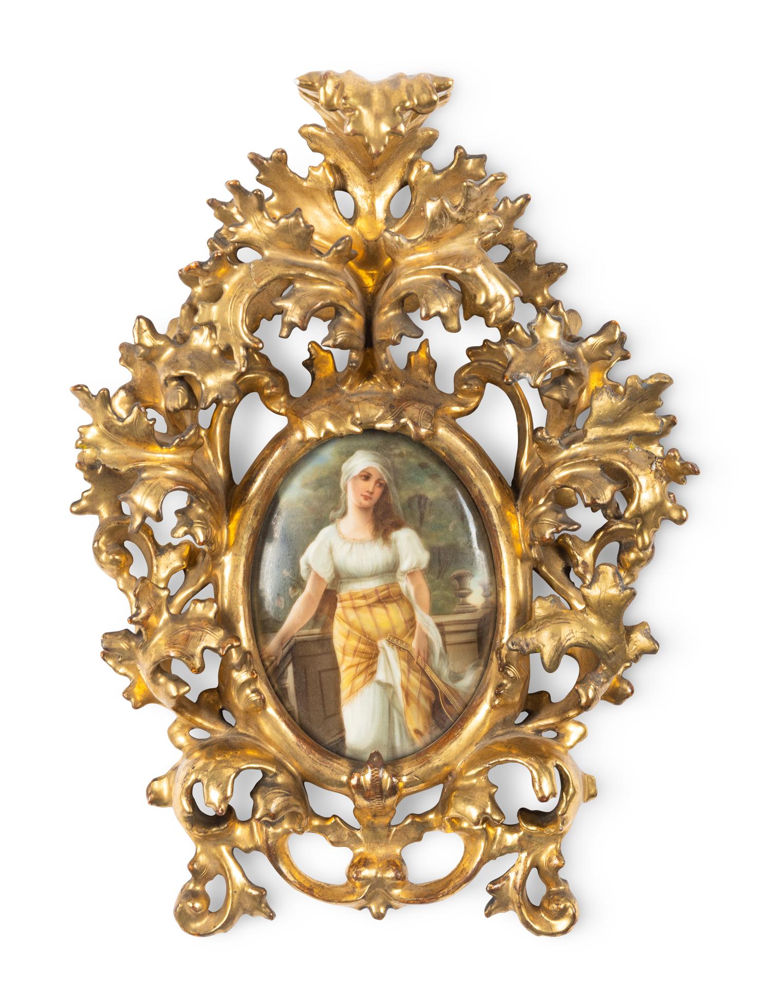 A Continental Porcelain Plaque in a Giltwood Frame