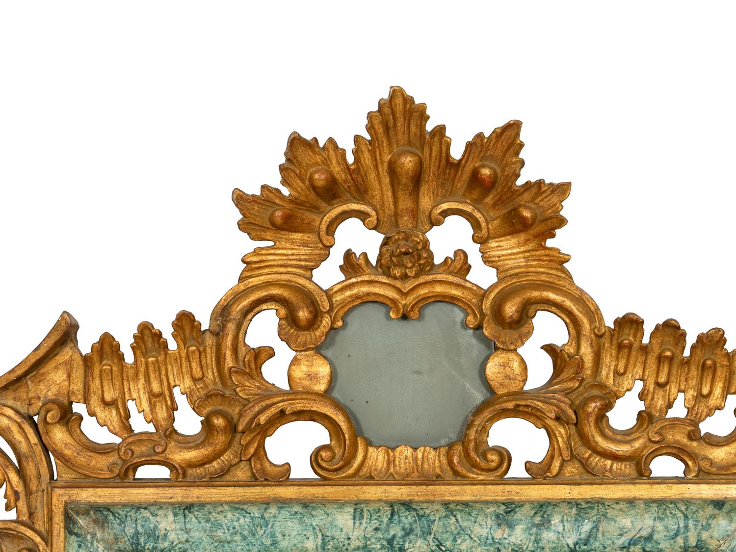 An Italian Baroque Style Giltwood and Simulated Marble-Painted Mirror