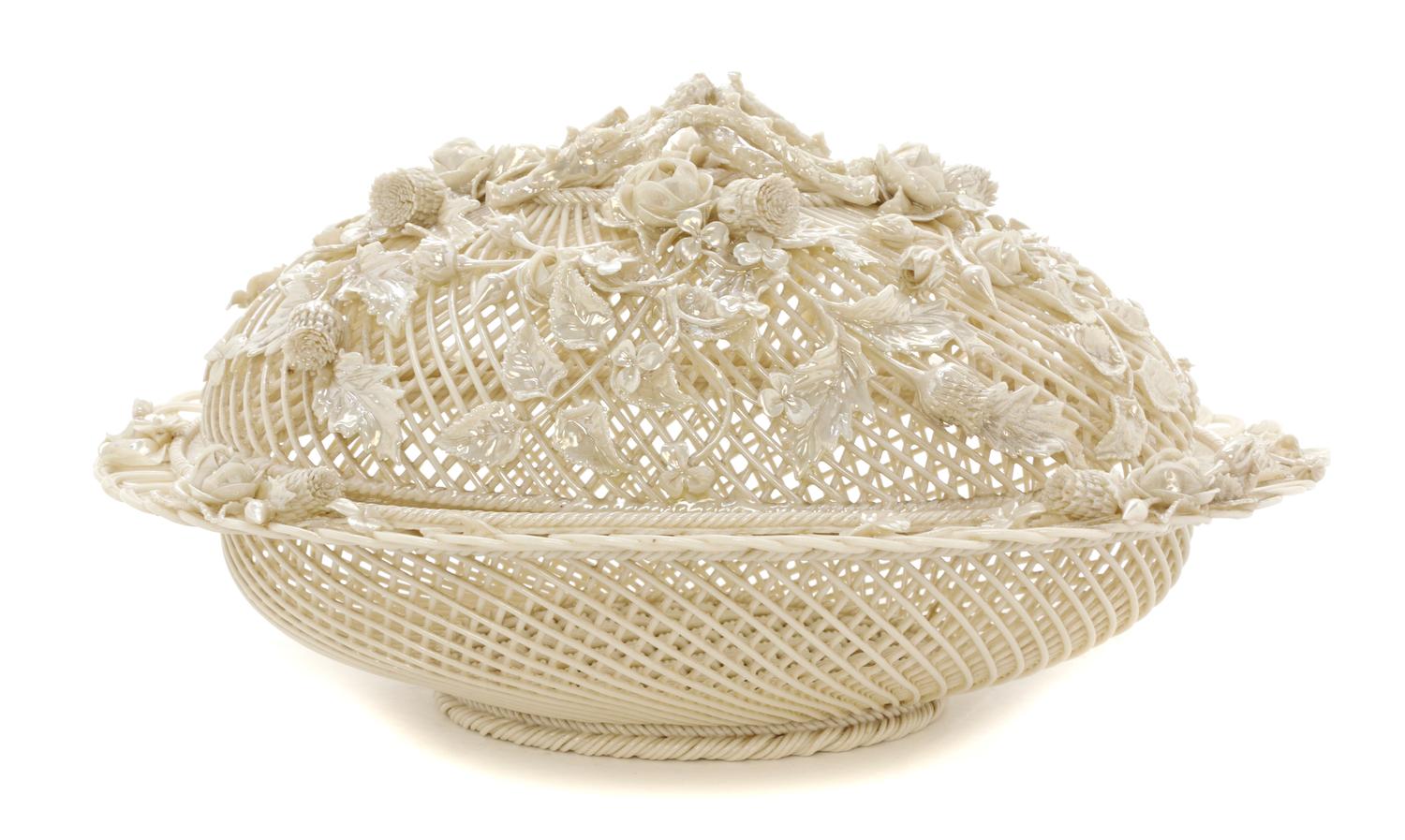 A Belleek Oval Basket and Cover, Width 12 1/4 inches.