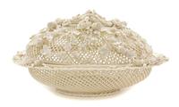 A Belleek Oval Basket and Cover, Width 12 1/4 inches.