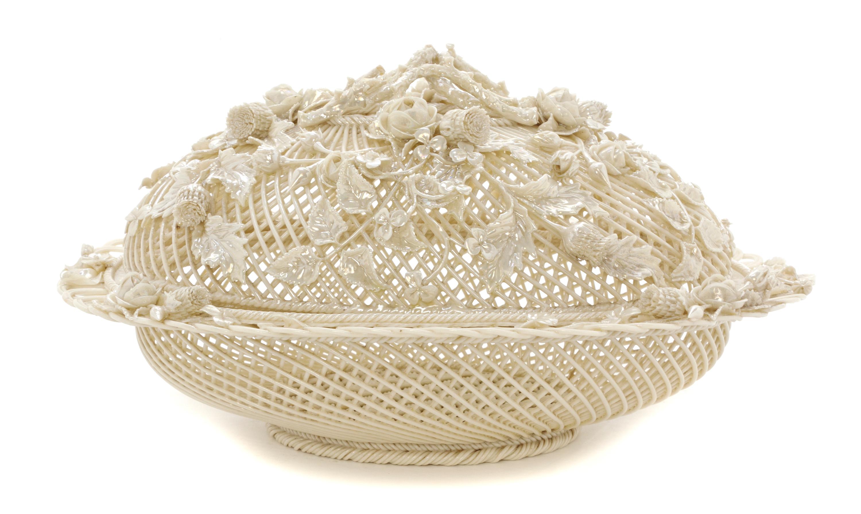 A Belleek Oval Basket and Cover, Width 12 1/4 inches.