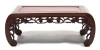 A Chinese Carved Hardwood Low Table Height 10 1/2 x width 29 x depth 14 3/4 inches.