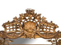 A Rococo Style Giltwood Mirror