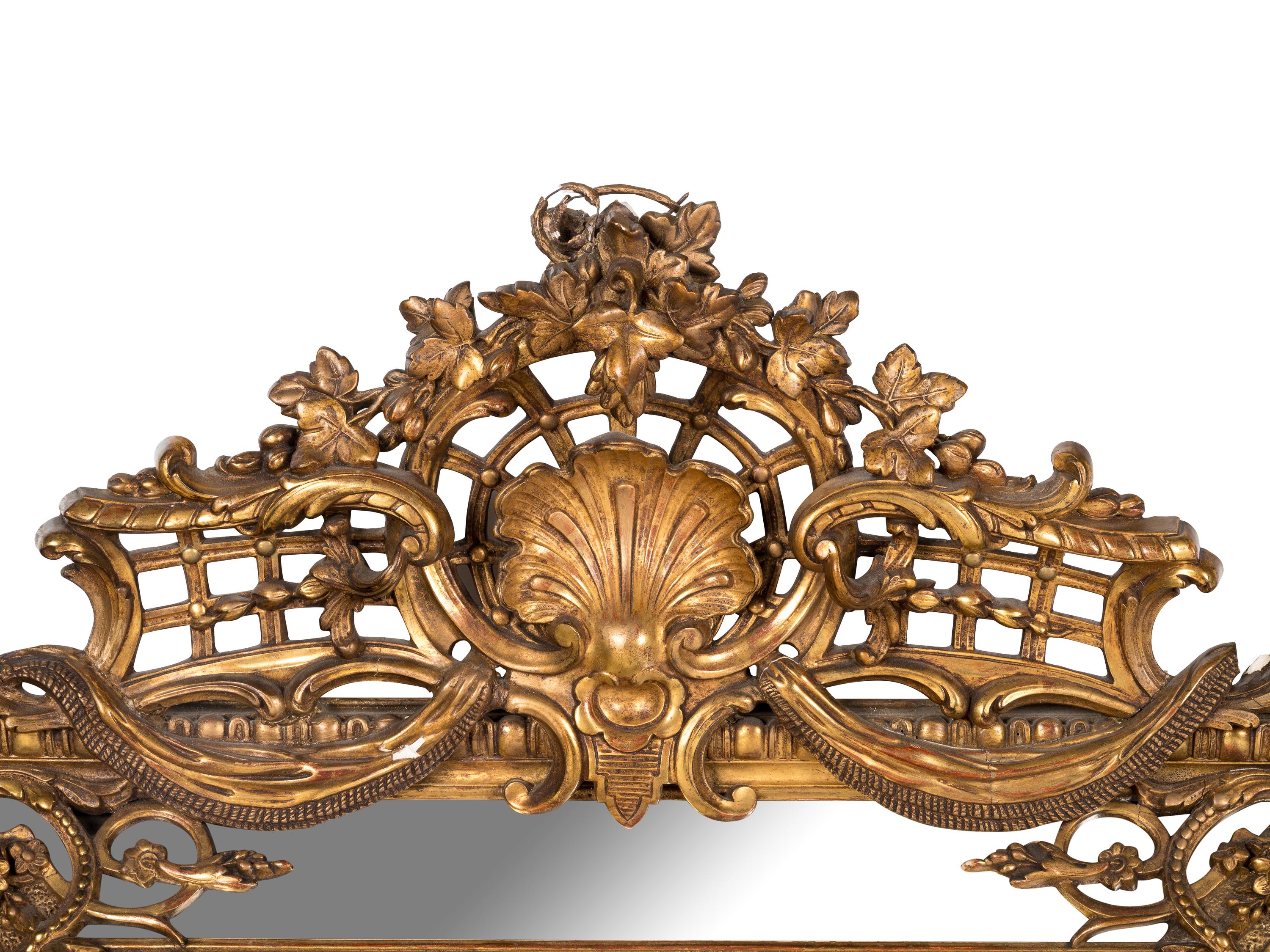 A Rococo Style Giltwood Mirror