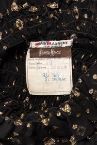 One Saint Laurent Rive Gauche Black Crepe Top and One Pair of Unlabeled Bell Bottom Denim Jeans, 1970s