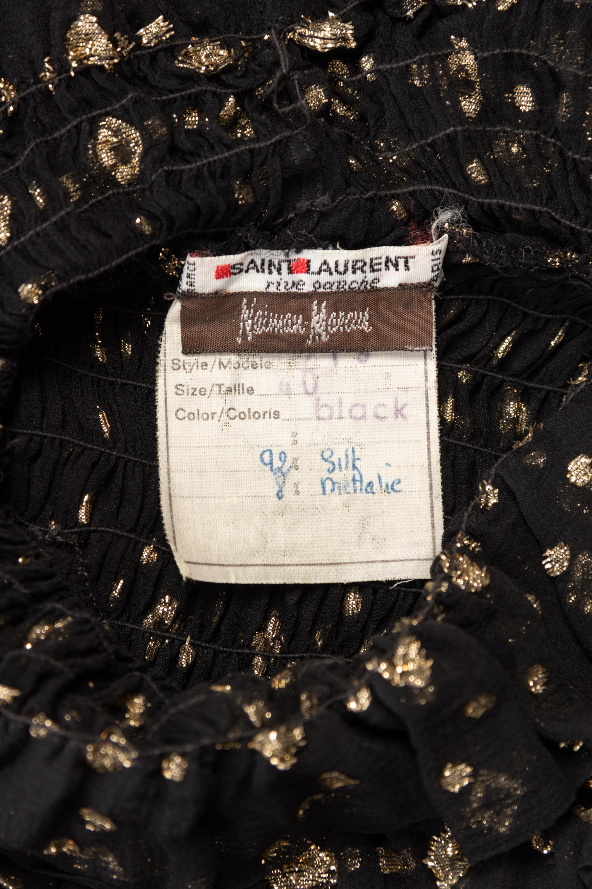 One Saint Laurent Rive Gauche Black Crepe Top and One Pair of Unlabeled Bell Bottom Denim Jeans, 1970s
