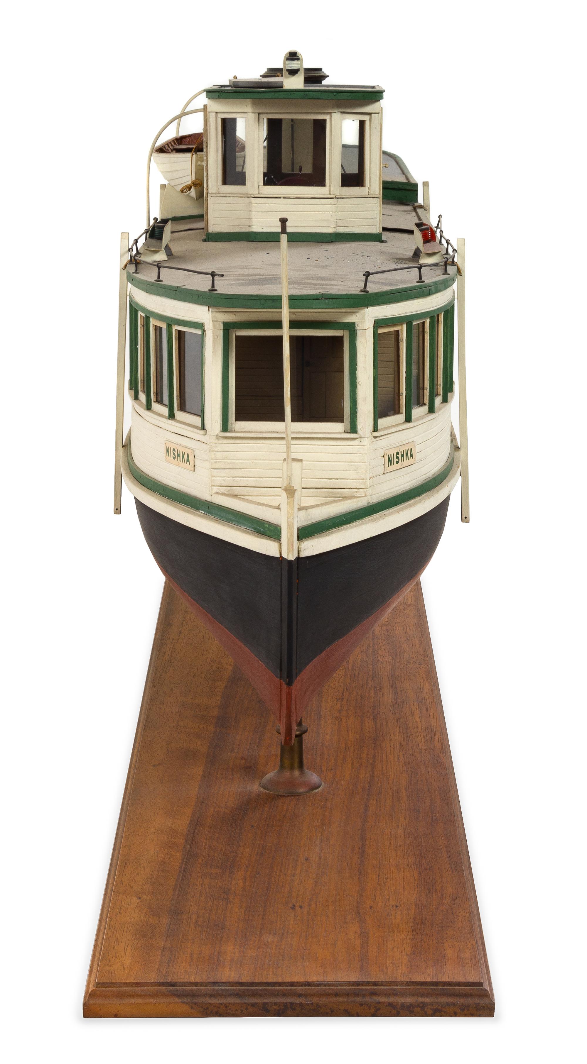 A Model of the "Nishka" Height of model 23 7/8 x length 58 inches.