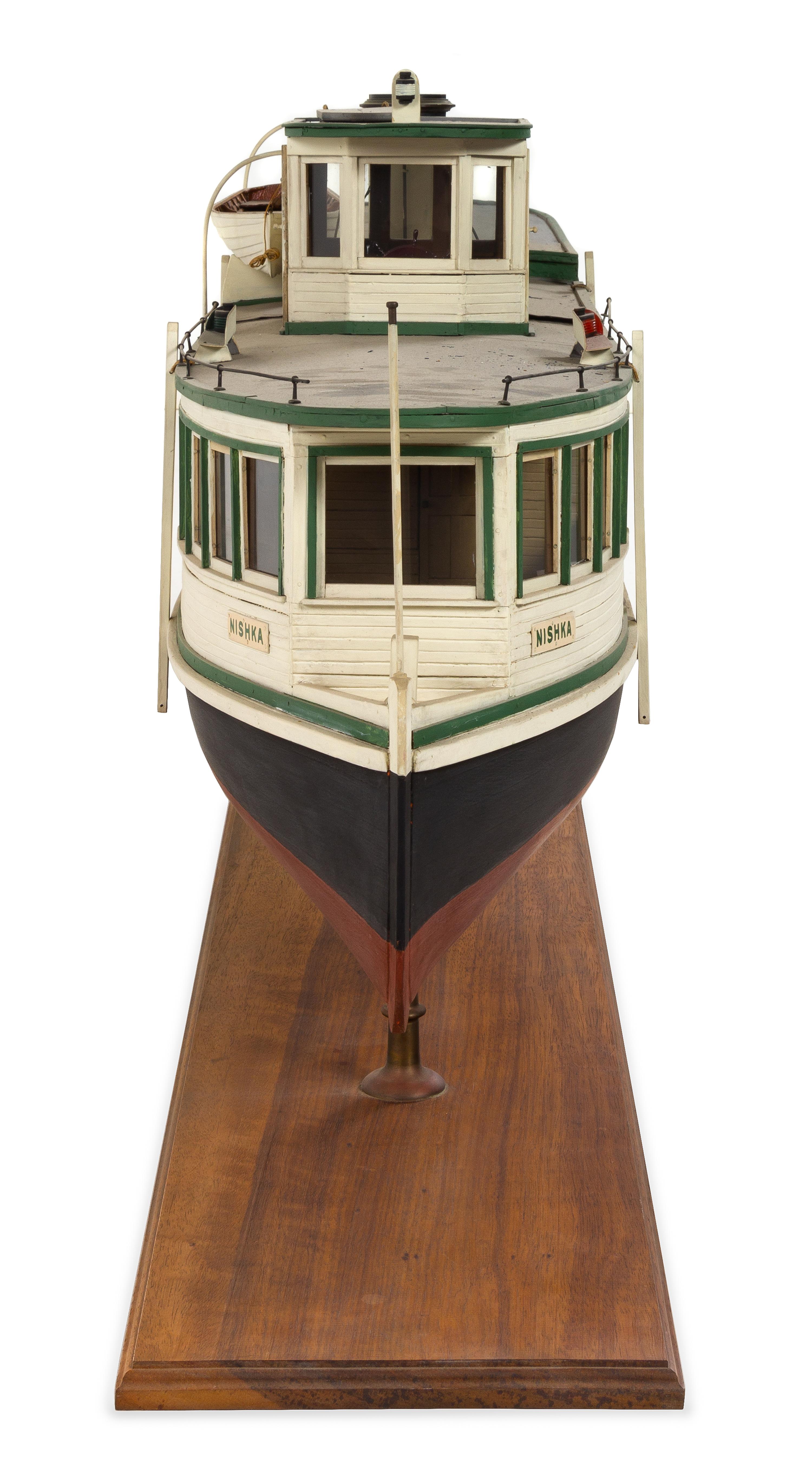 A Model of the "Nishka" Height of model 23 7/8 x length 58 inches.