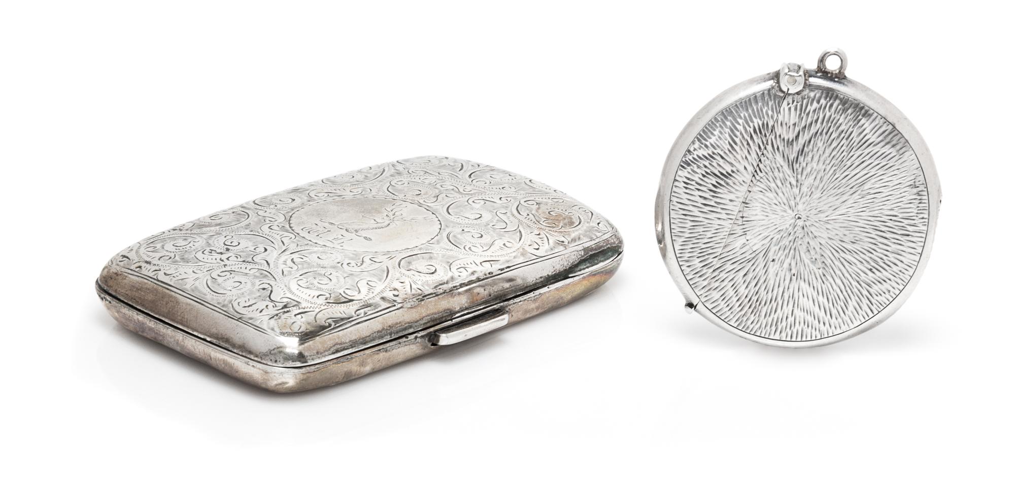Two English Silver Boxes, Various Makers, comprising a Victorian cigarette case worked to show foliate volutes and centered by a stag h