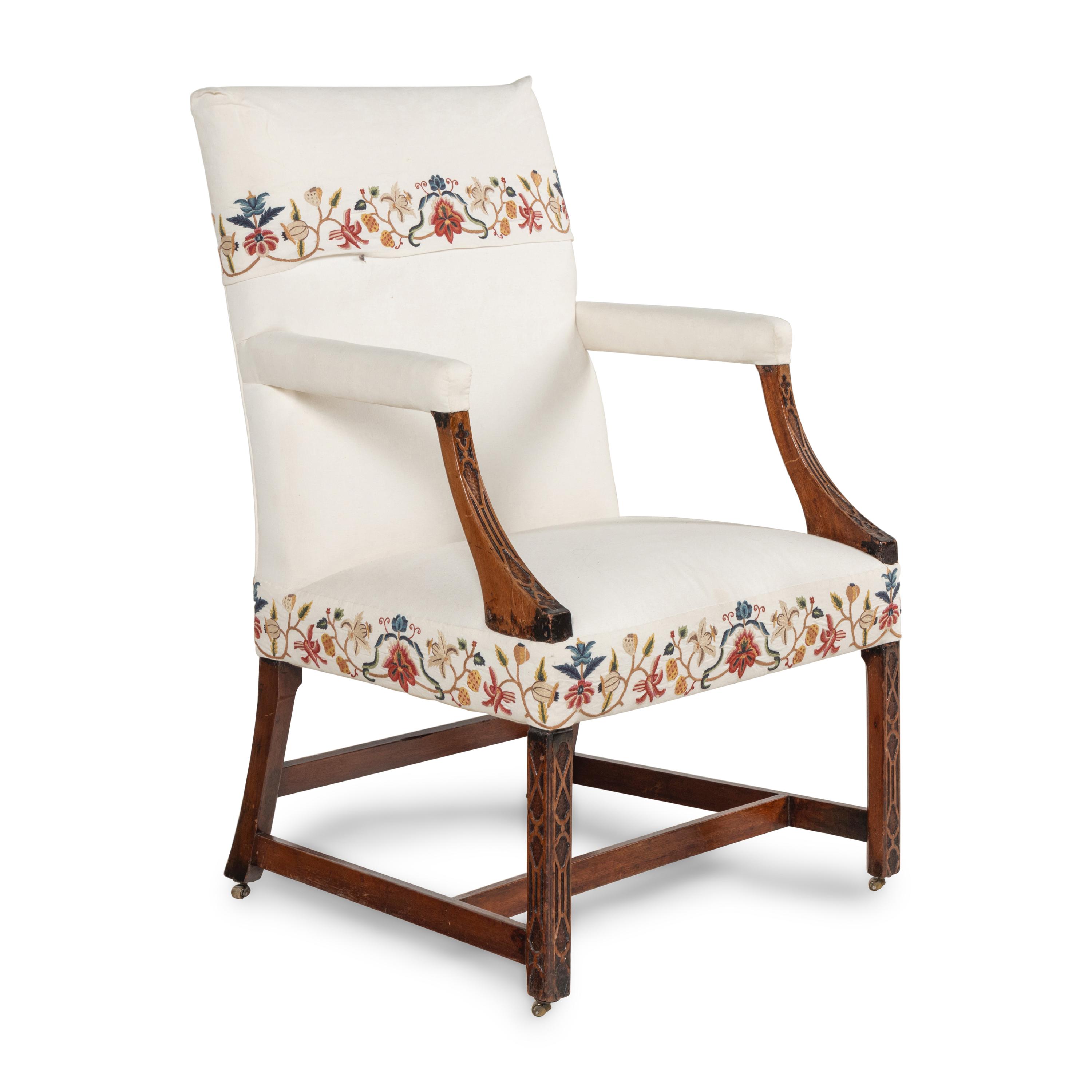 A George III Fret-Carved Mahogany Library Armchair