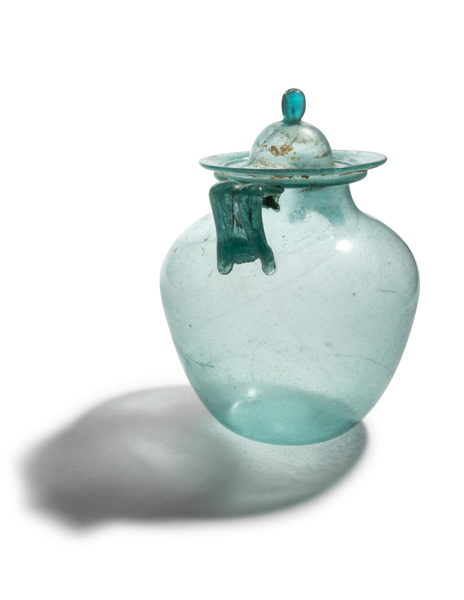 A Roman Glass Cinerary Urn and Lid
