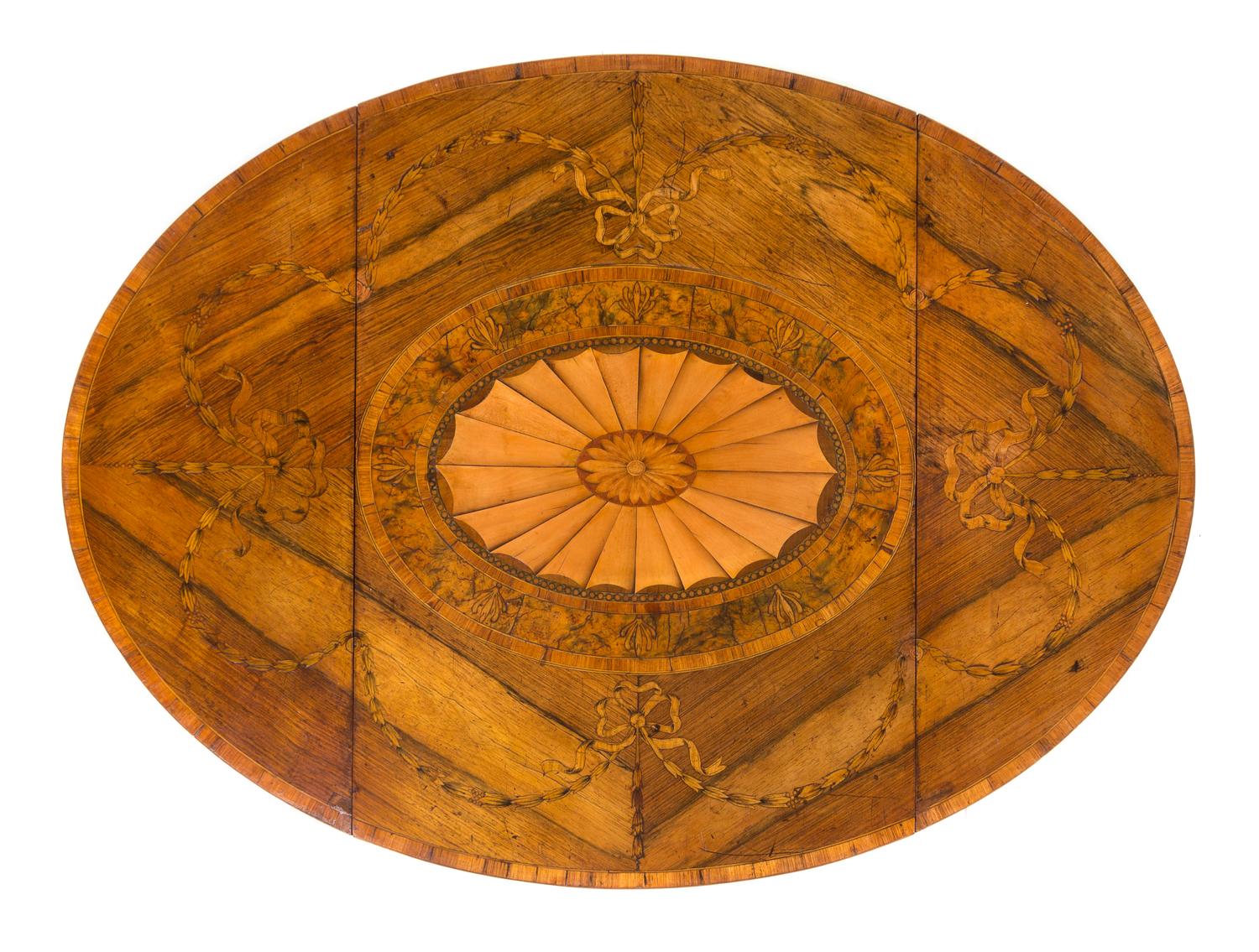A George III Satinwood, Rosewood and Marquetry Pembroke Table Height 28 1/8 x width 37 (open) x depth 27 1/2 inches. — CIRCA 1780
