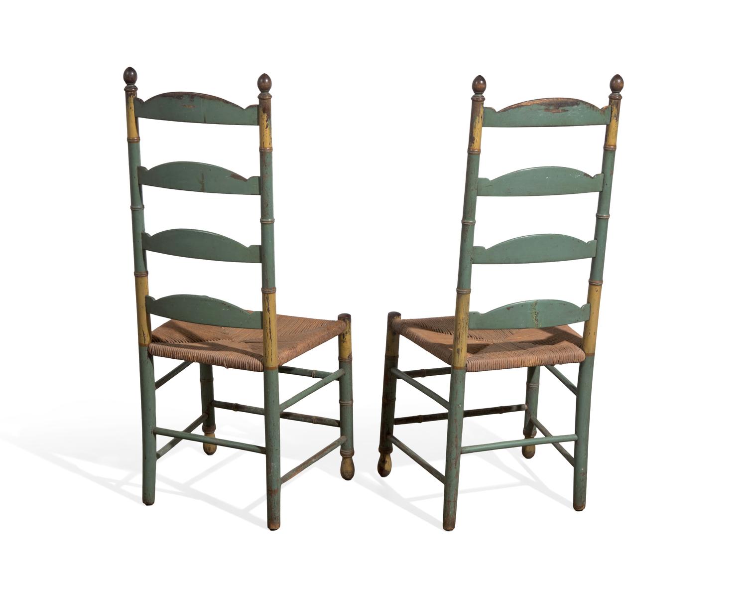 A Pair of Green-Painted and Decorated Ladder-Back Rush-Seat Side Chairs