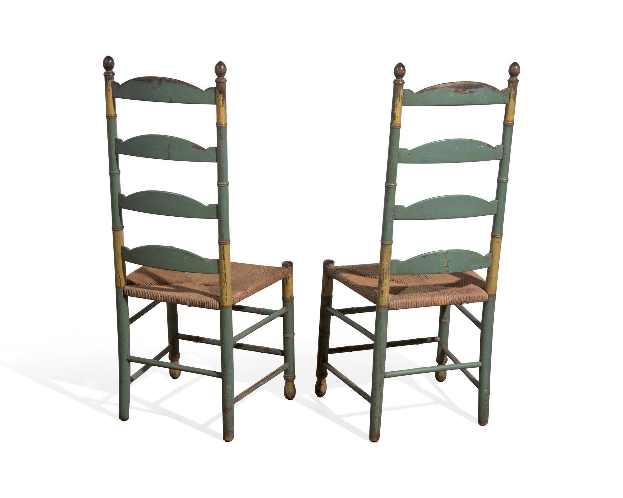 A Pair of Green-Painted and Decorated Ladder-Back Rush-Seat Side Chairs