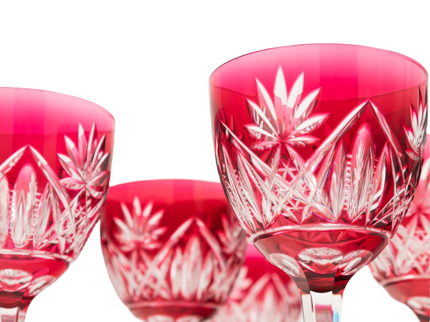 A Set of Ten Cranberry Cut-to-Clear Glass Wine Stems
