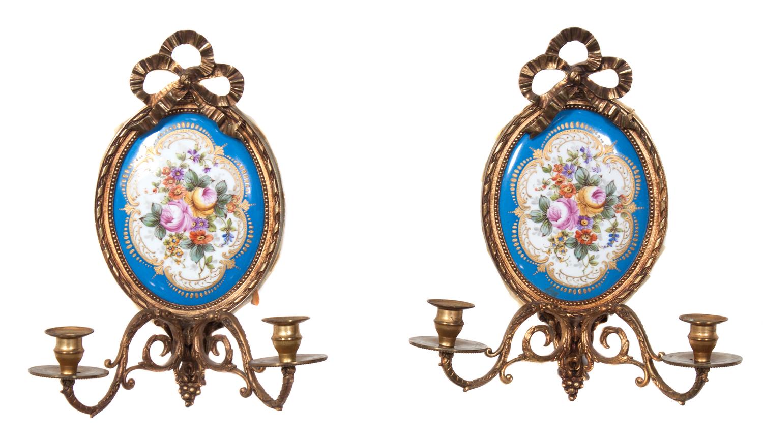 A Pair of Sevres Style Porcelain Mounted Gilt Bronze Two-Light Sconces Height 14 1/2 inches. — EARLY 20TH CENTURY