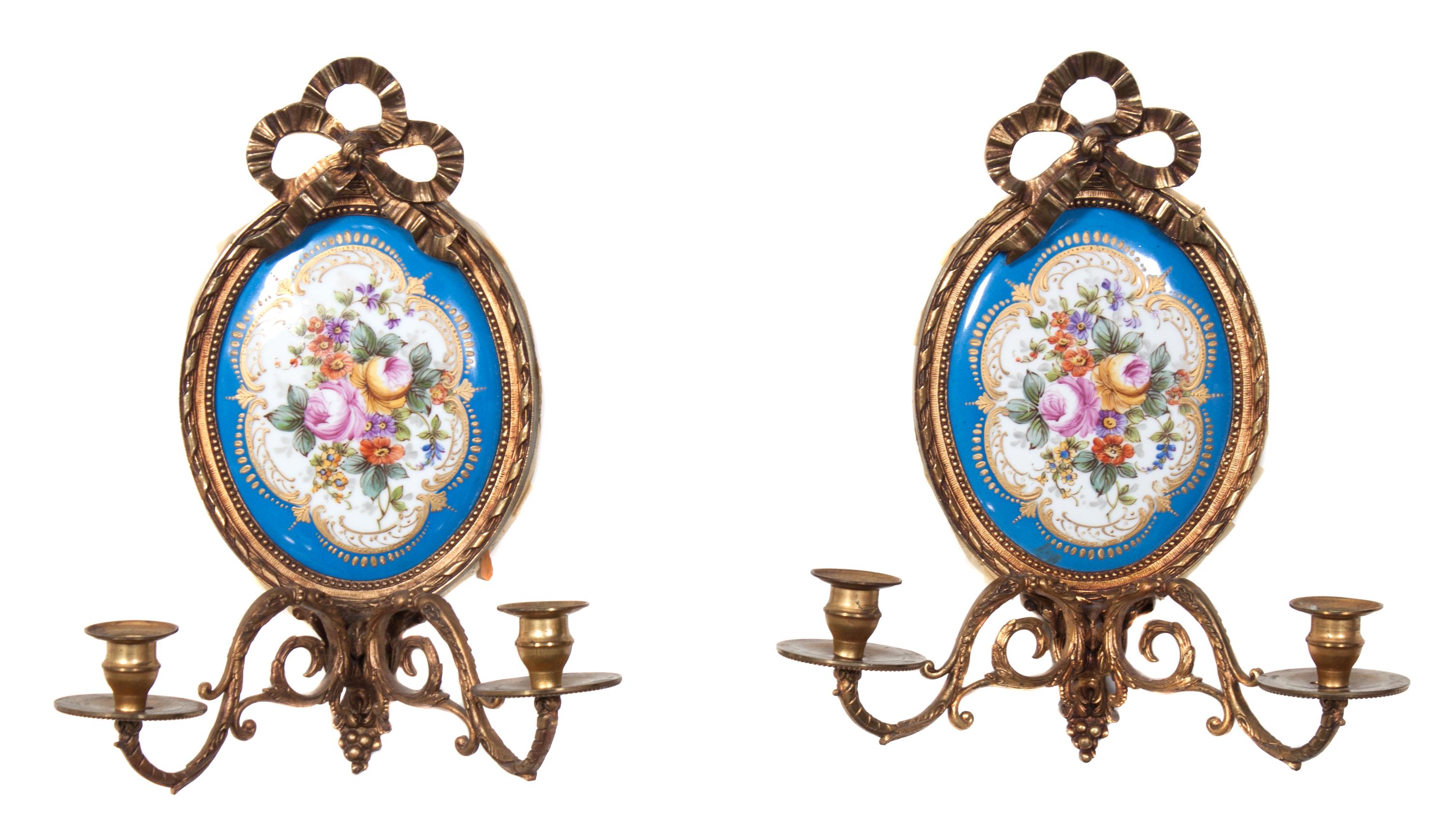A Pair of Sevres Style Porcelain Mounted Gilt Bronze Two-Light Sconces Height 14 1/2 inches. — EARLY 20TH CENTURY