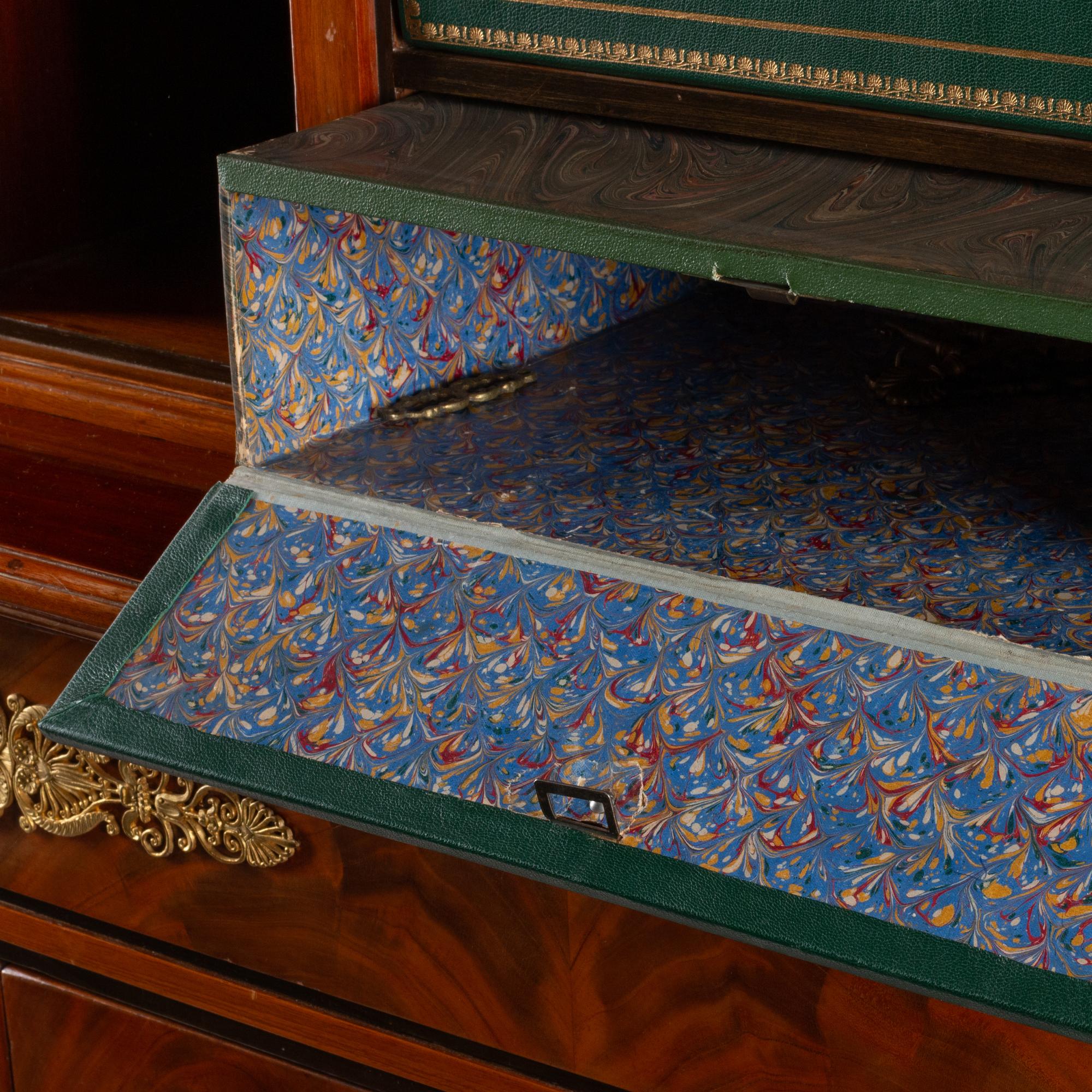 An Empire Style Gilt Bronze Mounted Mahogany Cabinet and Cartonnier