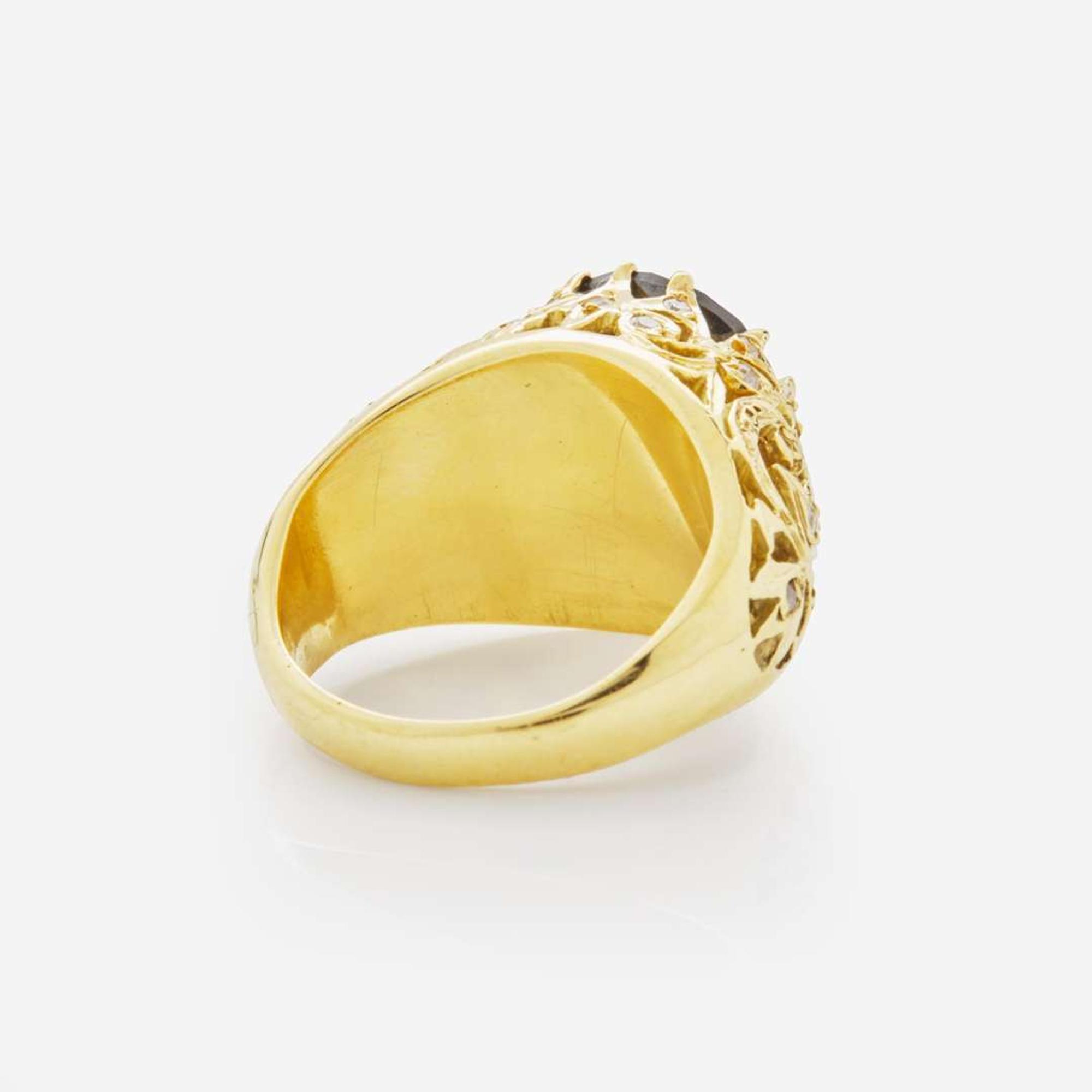 An 18K Yellow Gold and Black Diamond Ring