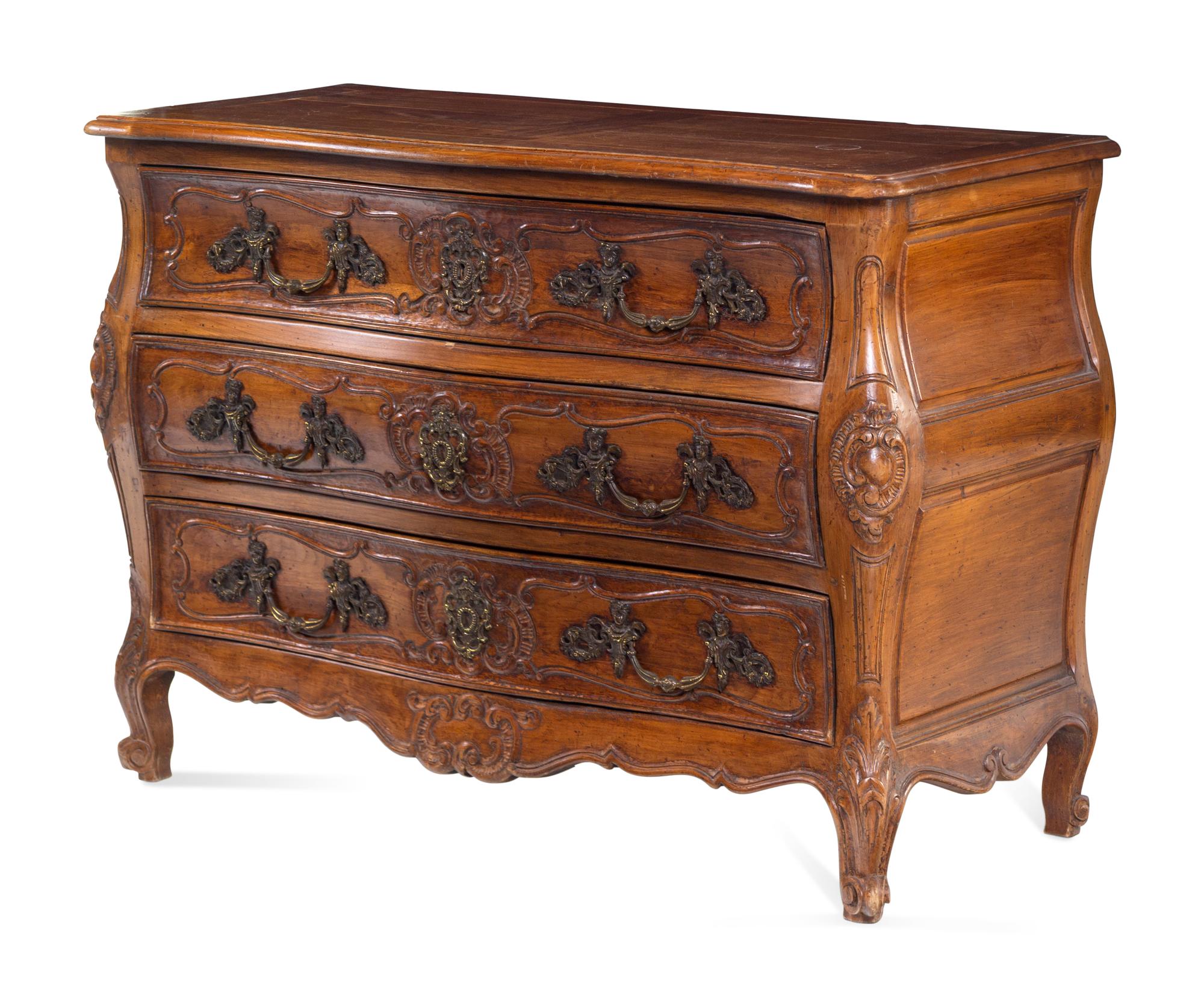 A Louis XV Provincial Style Walnut Commode