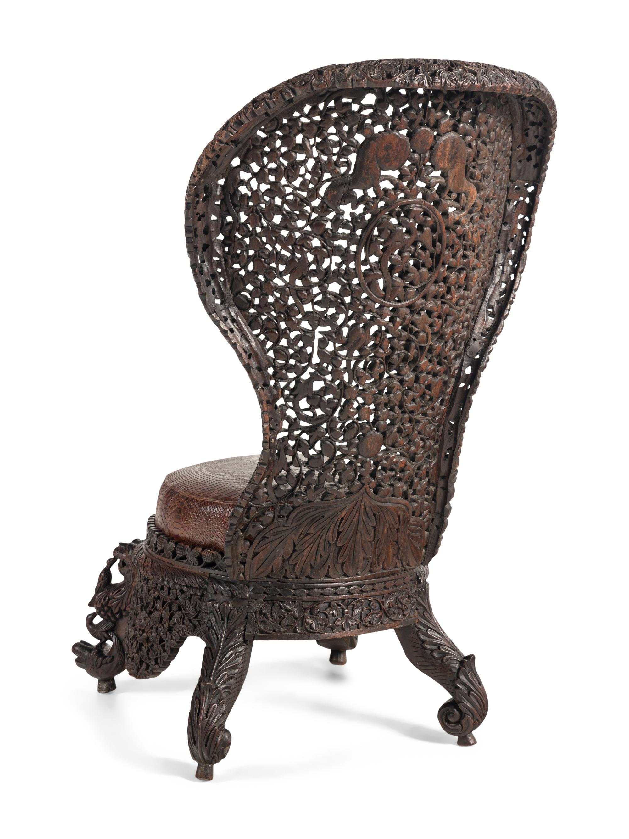 An Anglo-Indian Carved Hardwood Slipper Chair