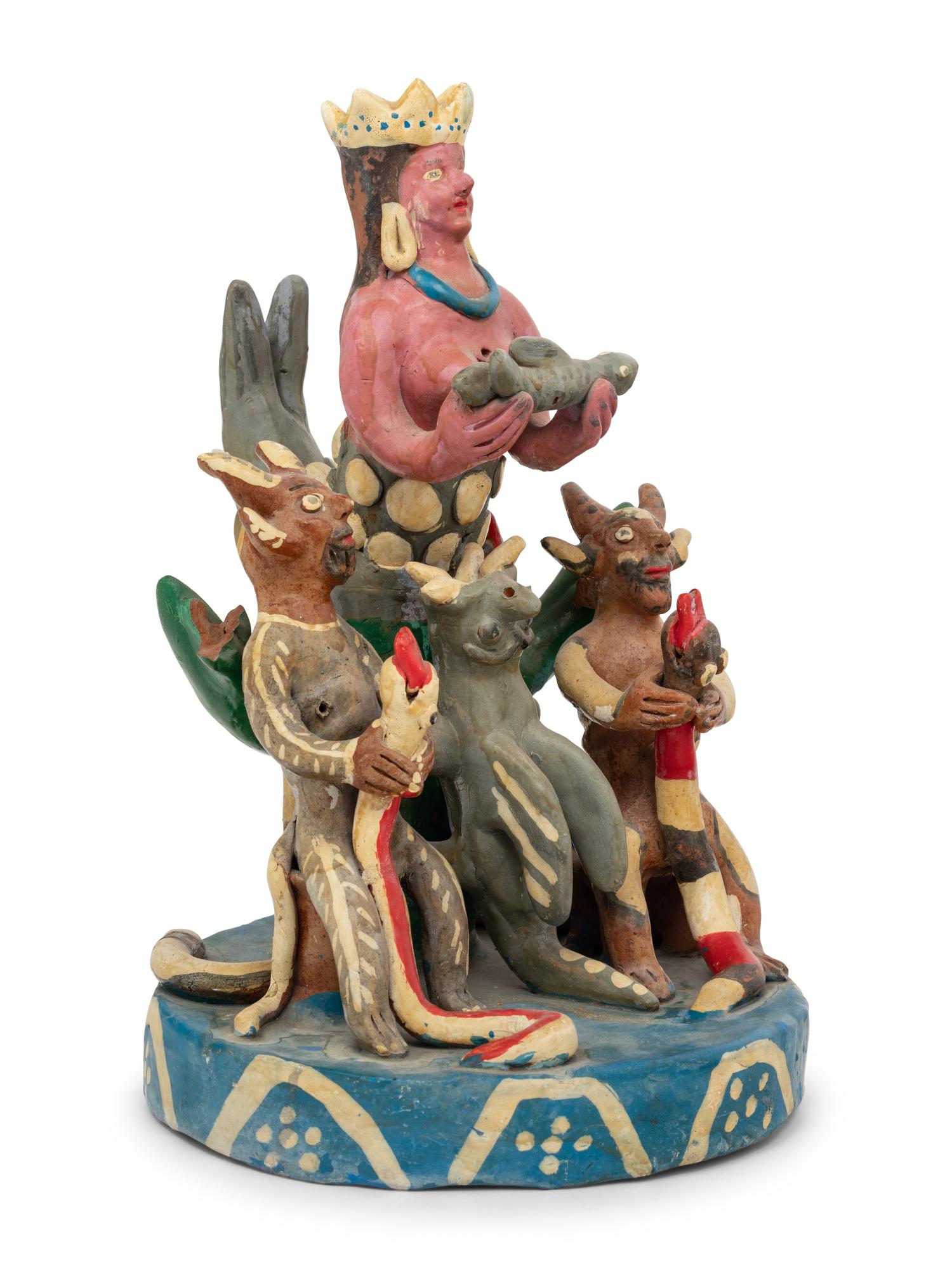 A Mexican Folk Art Polychrome Decorated Figural Group