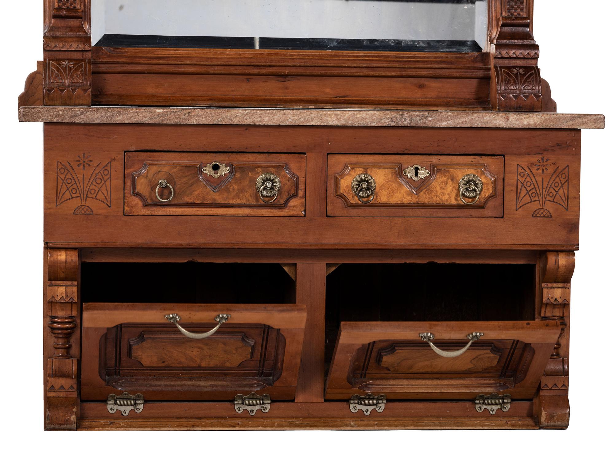 An Eastlake Style Hall Mirror with Marble Top Cabinet Base