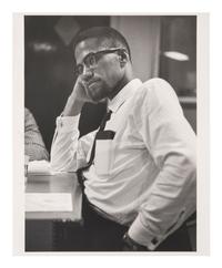 [MALCOLM X (1925-1965)]. SCHATT, Roy (1919-2002). Silver gelatin photograph of Malcolm X. New York, 1964.