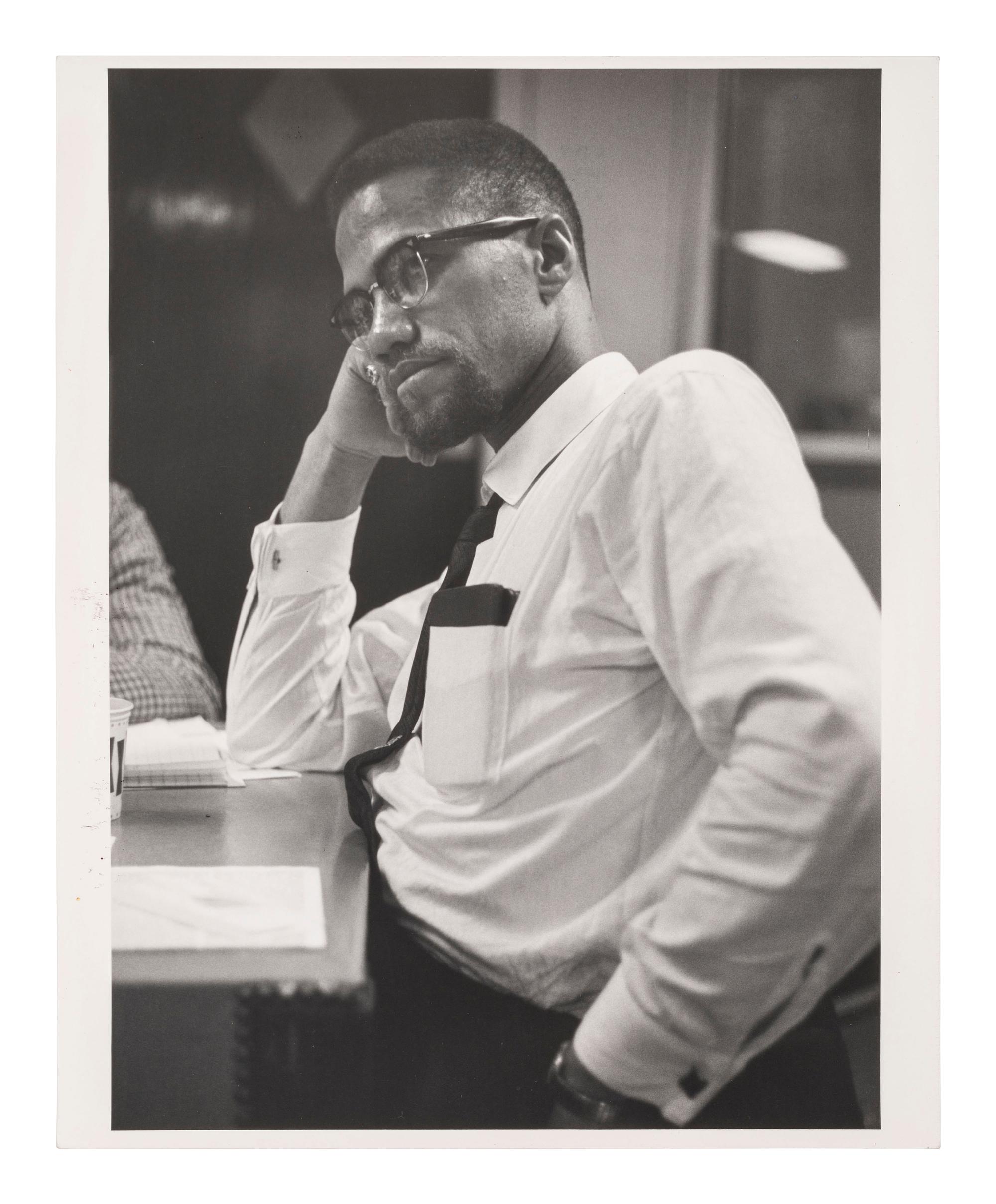 [MALCOLM X (1925-1965)]. SCHATT, Roy (1919-2002). Silver gelatin photograph of Malcolm X. New York, 1964.