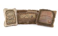 A Group of Three Tapestry Throw Pillows