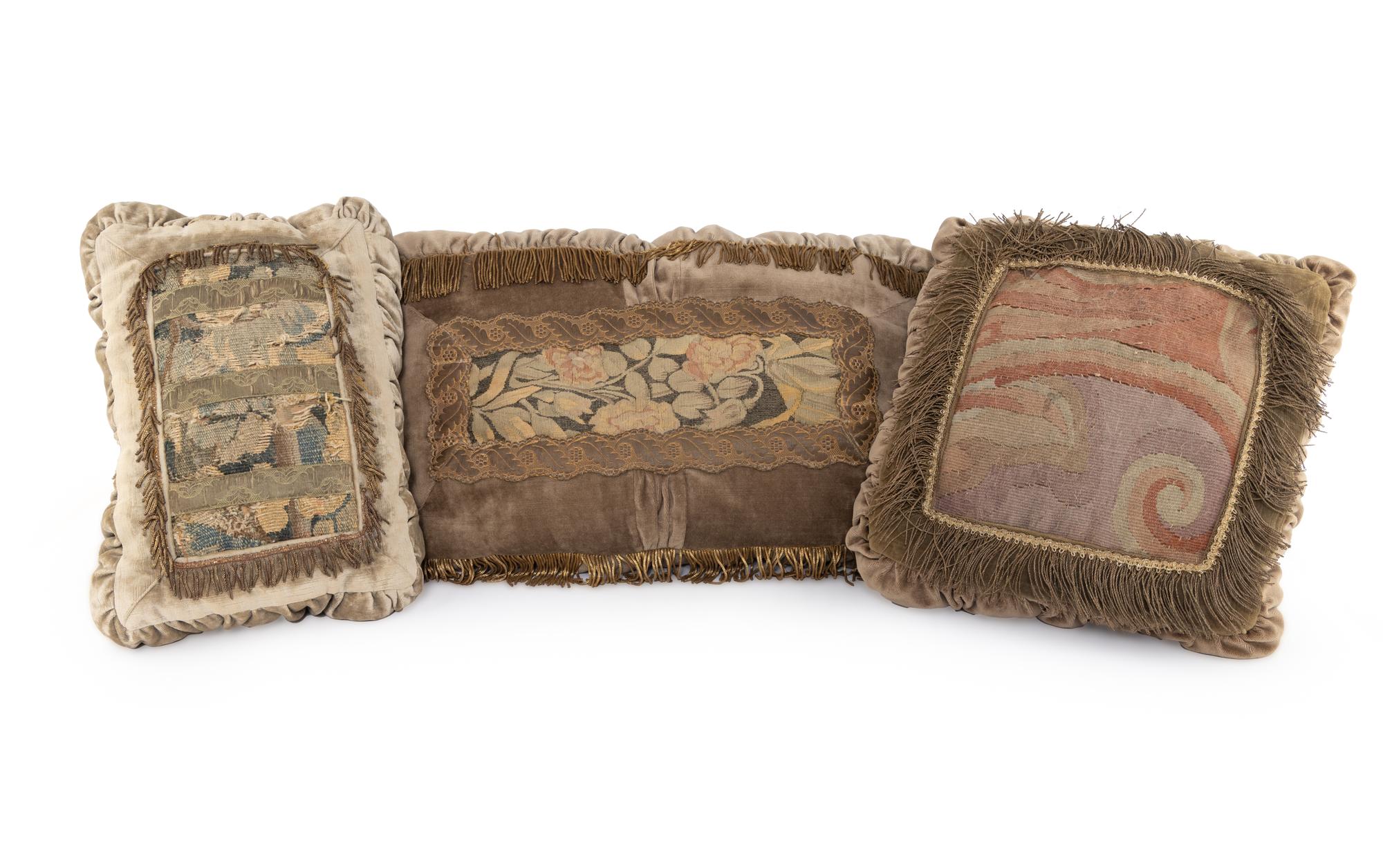 A Group of Three Tapestry Throw Pillows