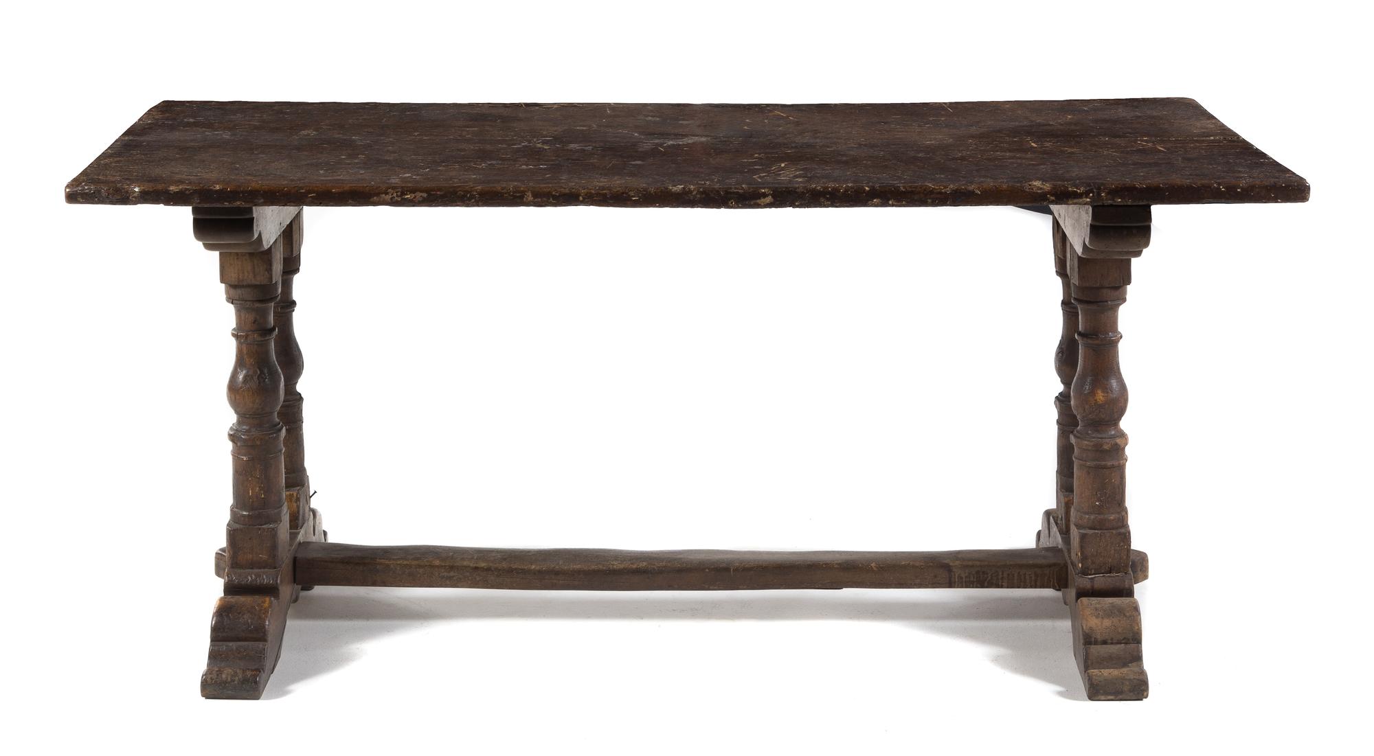 An Italian Walnut Refectory Table Height 30 x width 67 3/4 x depth 28 3/4 inches. — EARLY 20TH CENTURY