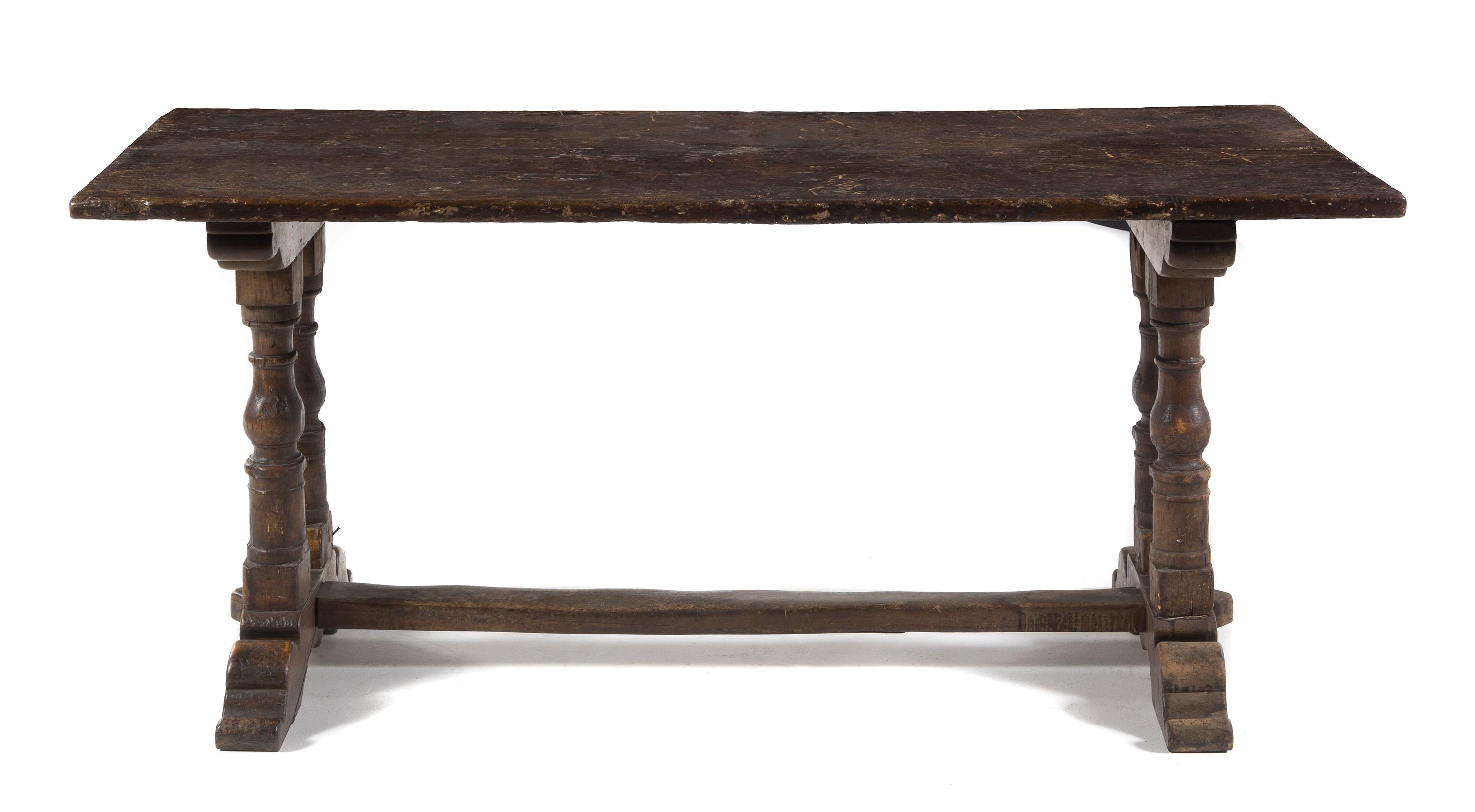 An Italian Walnut Refectory Table Height 30 x width 67 3/4 x depth 28 3/4 inches. — EARLY 20TH CENTURY