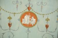 A Pair of Neoclassical Style Painted Wood Panels