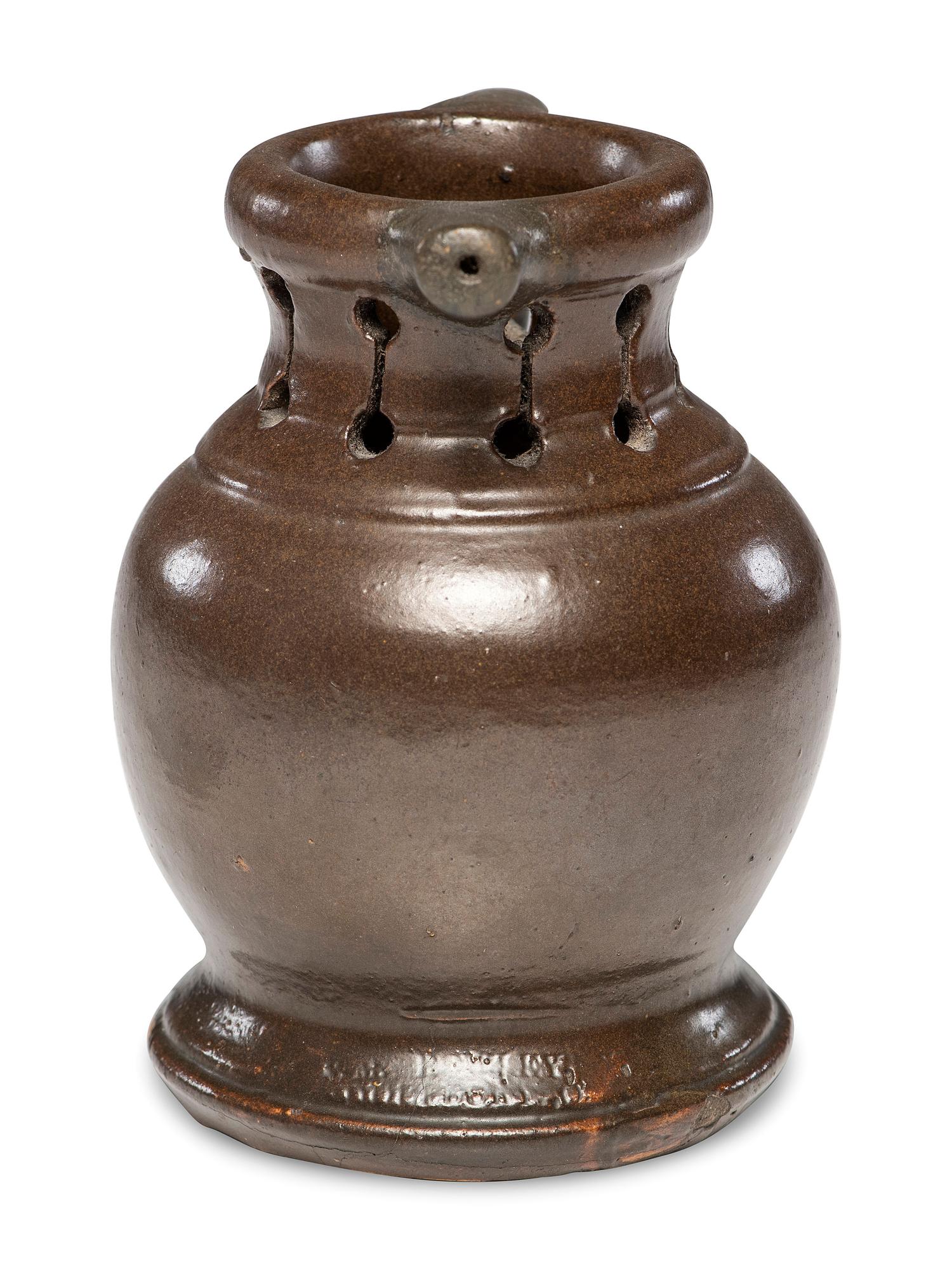 A Rare William Rowley Slip-Glazed Puzzle Jug