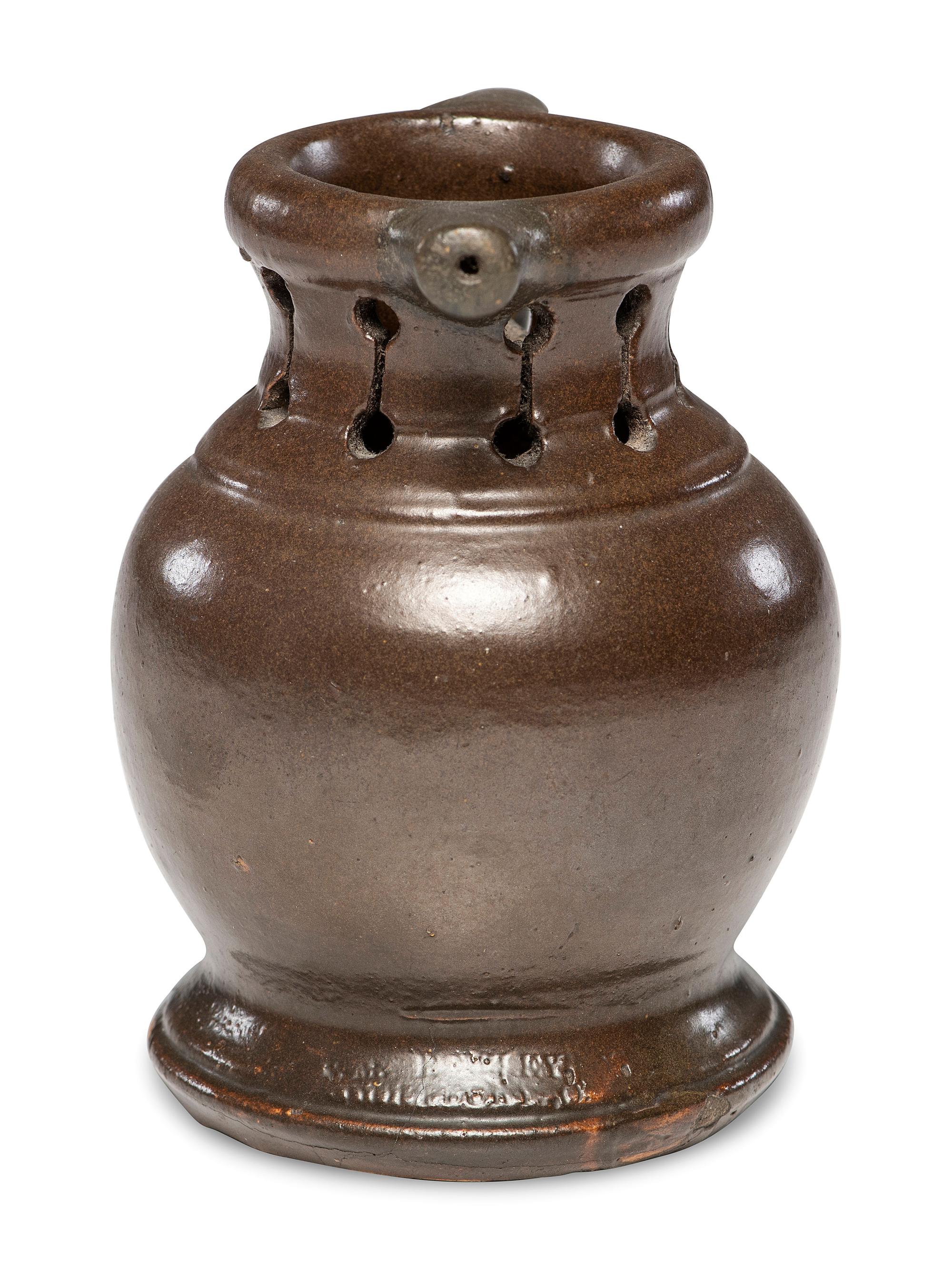 A Rare William Rowley Slip-Glazed Puzzle Jug