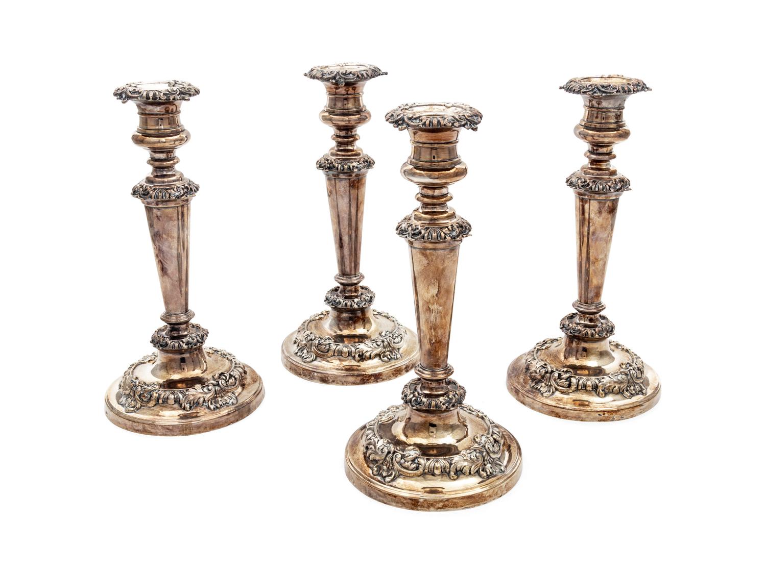 Four Silver Candlesticks