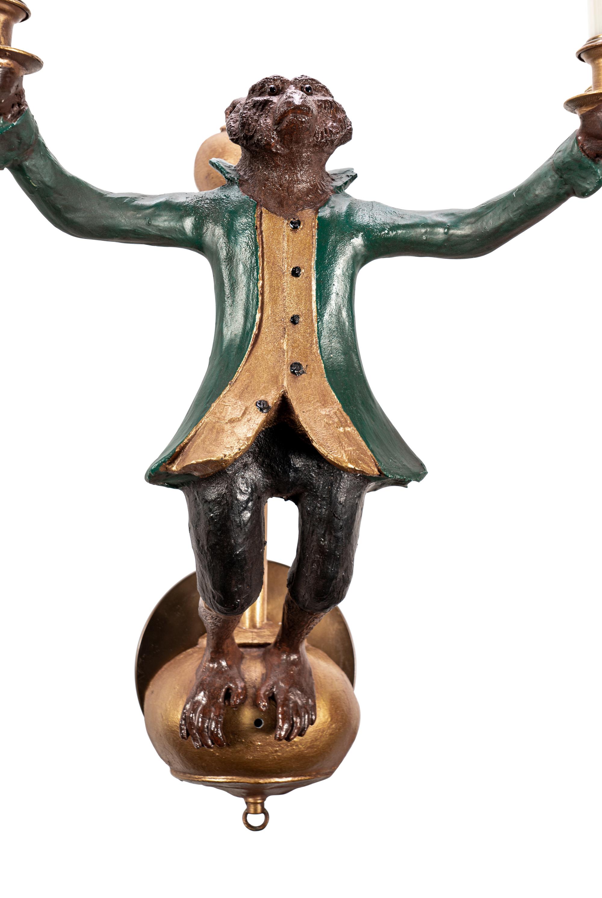 A Pair of Polychromed Composition Two-Light Sconces