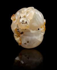 A Chinese Carved Agate Toggle SUZHOU SCHOOL, 18TH/19TH CENTURY Length 1 7/8 inches. — SUZHOU SCHOOL, 18TH/19TH CENTURY