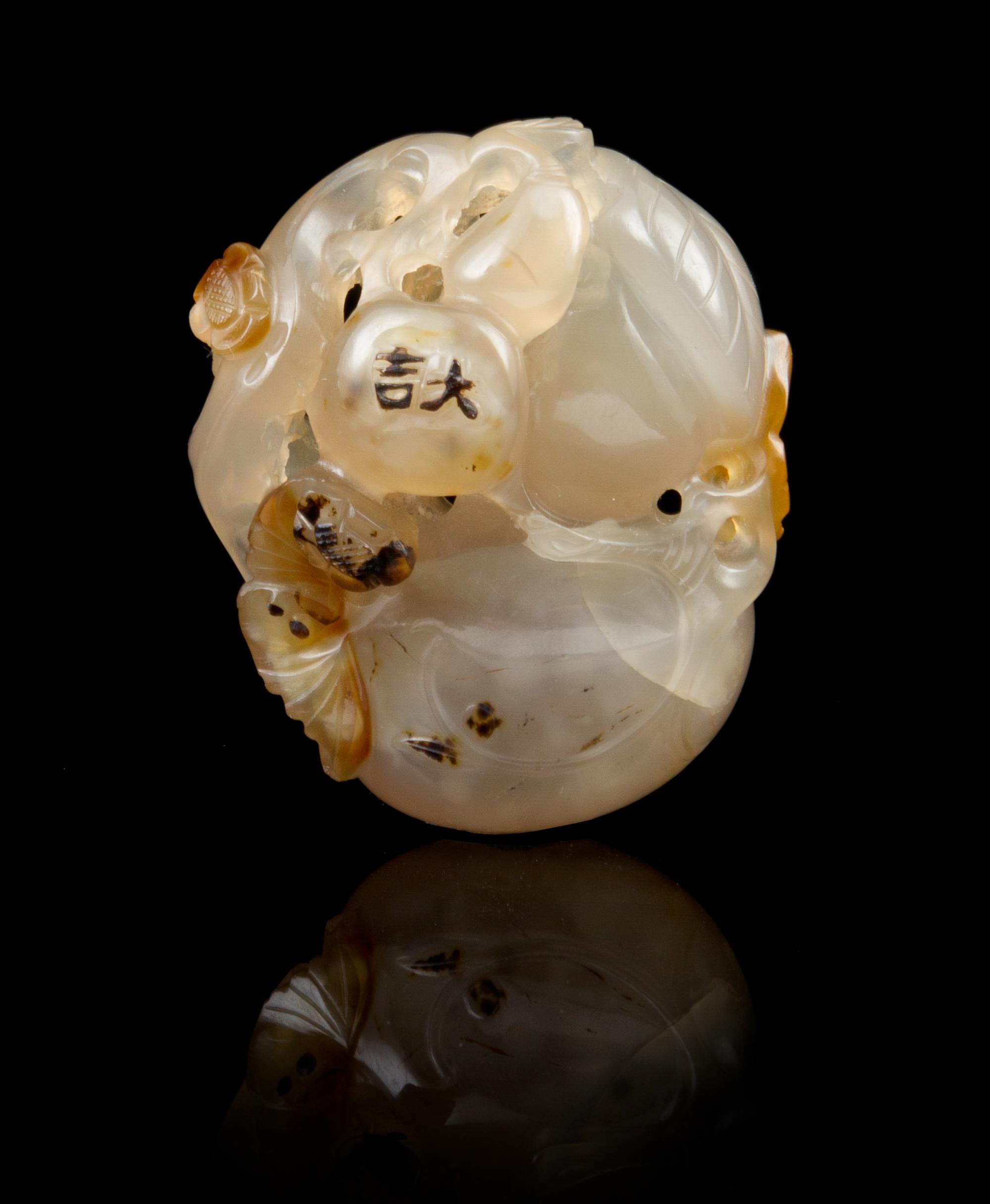 A Chinese Carved Agate Toggle SUZHOU SCHOOL, 18TH/19TH CENTURY Length 1 7/8 inches. — SUZHOU SCHOOL, 18TH/19TH CENTURY