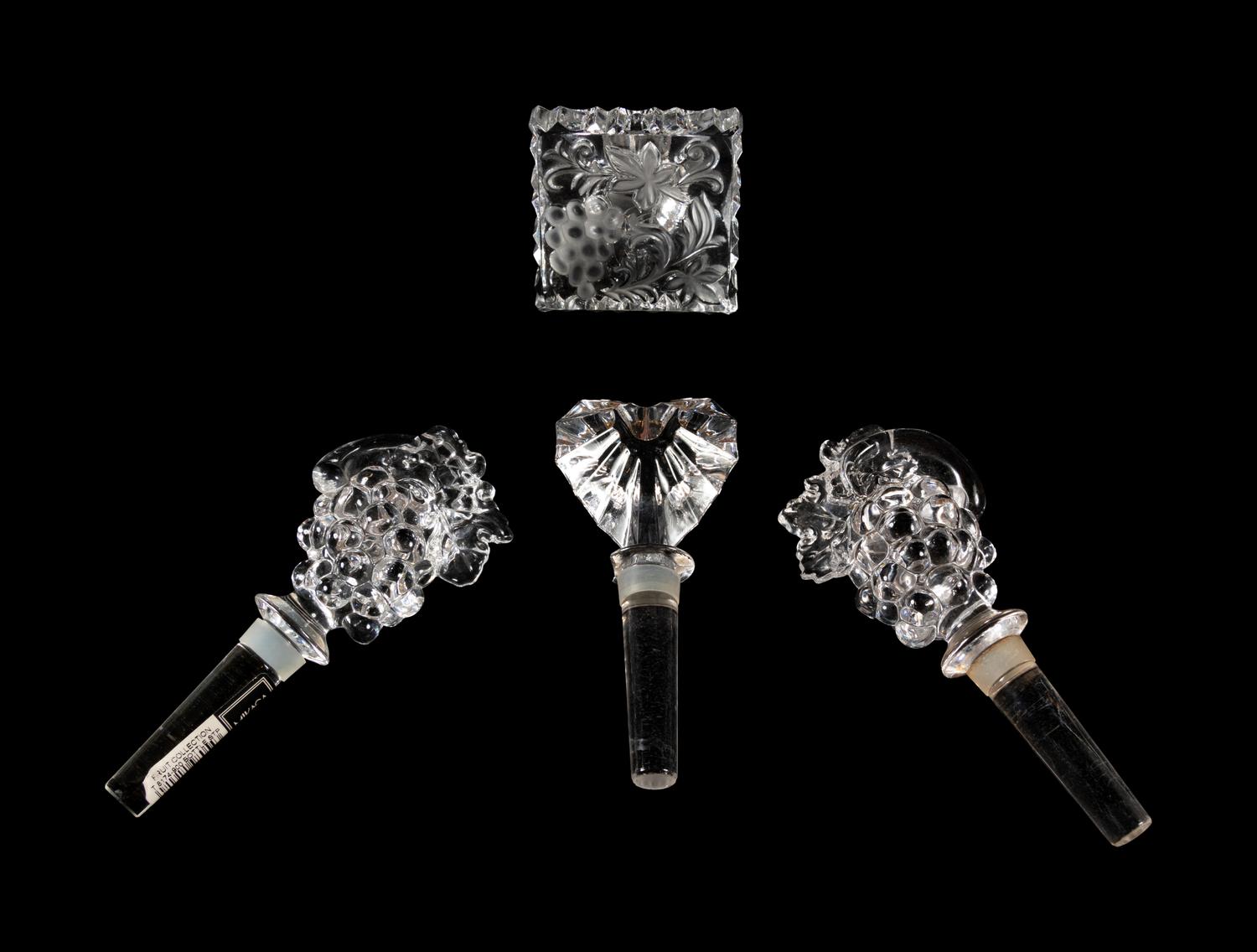 A Pair of French Sconces together with a Pair of Candlesticks and Four Stoppers