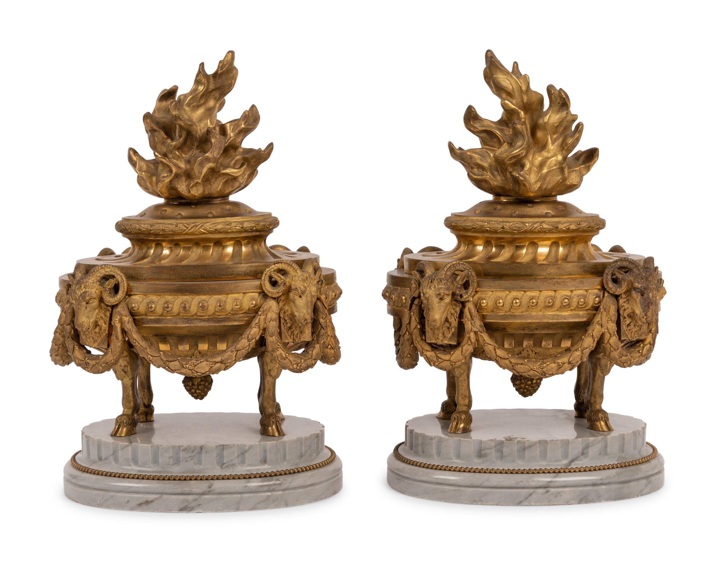 A Pair of French Neoclassical Gilt Bronze and Marble 'Flaming Urn' Ornaments