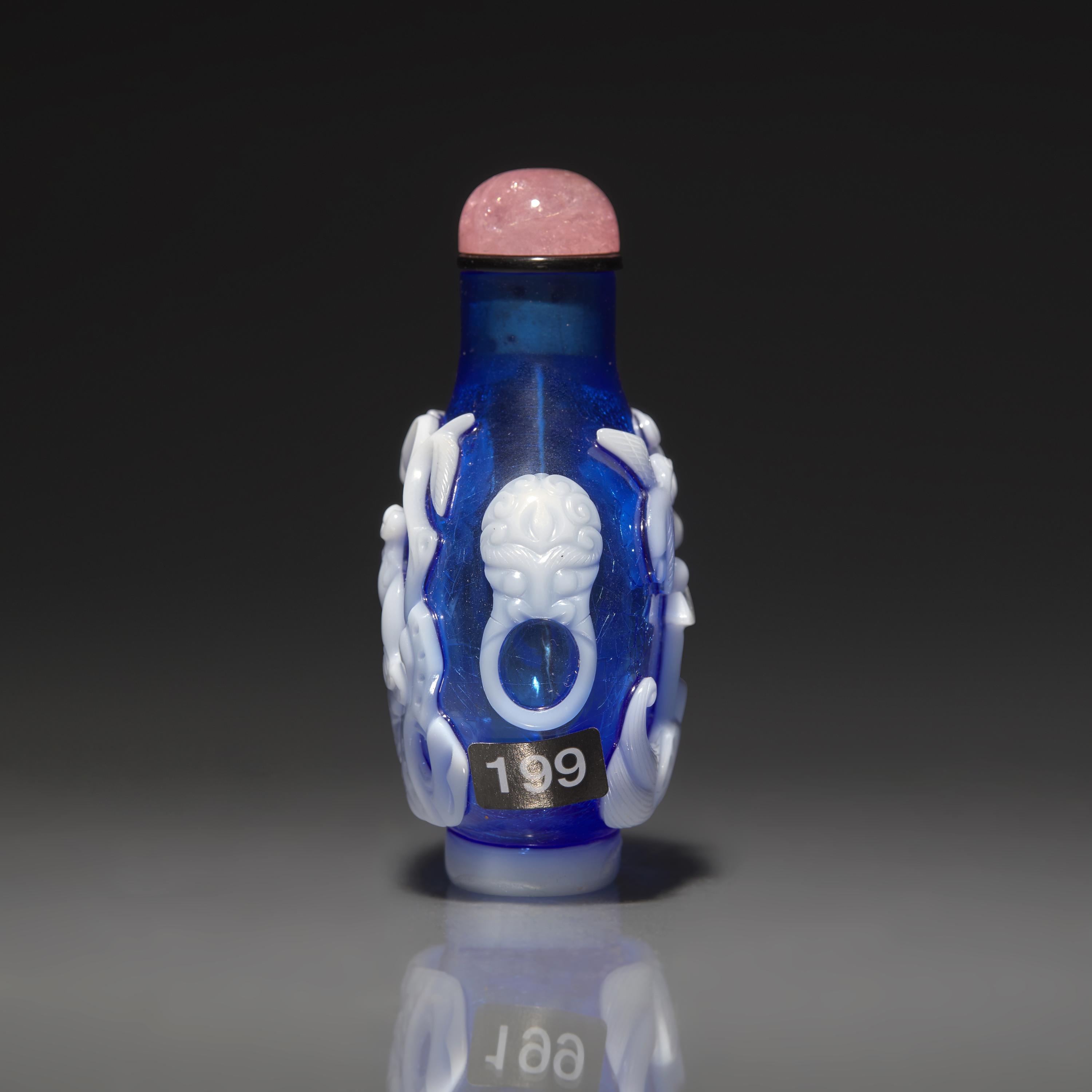 A Chinese White Overlay Blue Glass Snuff Bottle, Qing Dynasty, Possibly 18th-Early 19th Century 清中期 寶石藍地套涅白料垂釣圖鼻烟壺