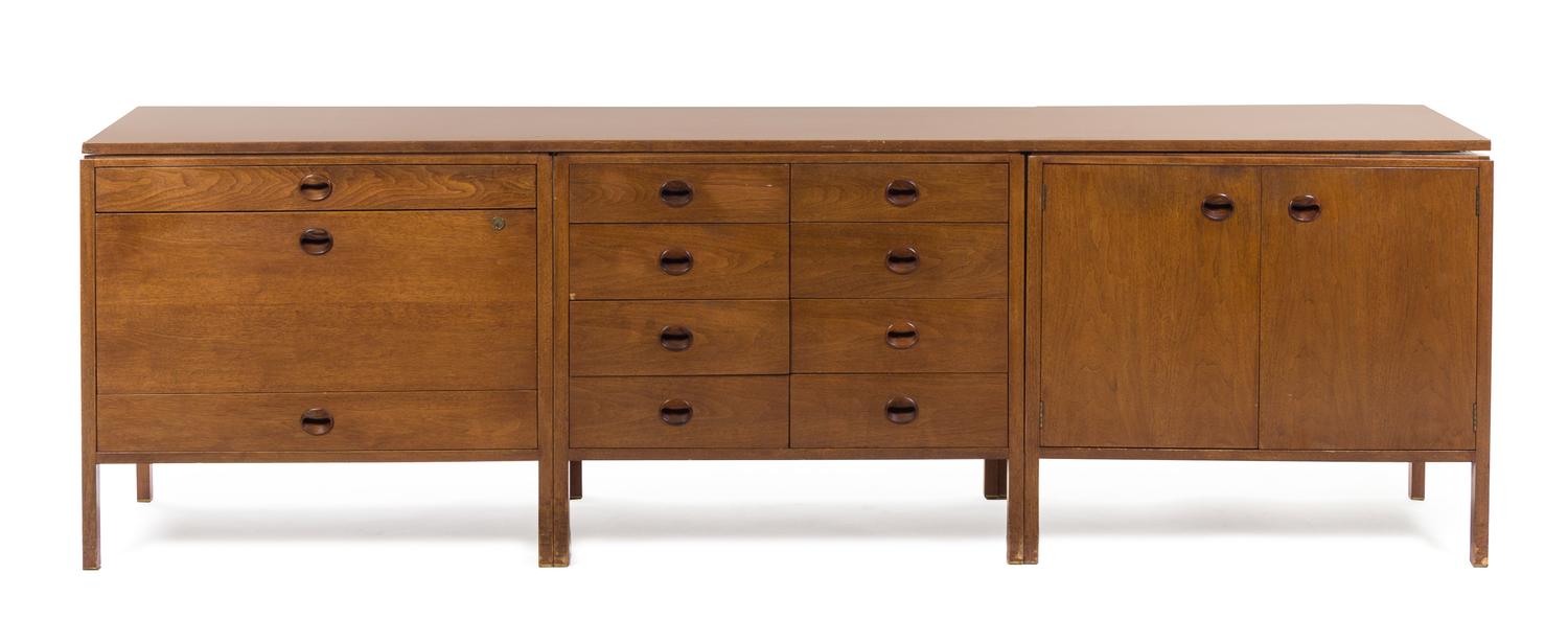 An Edward Wormley for Dunbar Walnut Cabinet Height 29 x width 95 3/4 x depth 20 inches.
