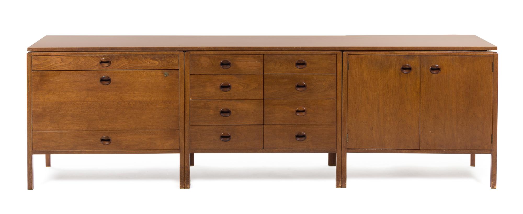 An Edward Wormley for Dunbar Walnut Cabinet Height 29 x width 95 3/4 x depth 20 inches.